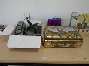 Box of electronics & a tin of electronics. As shown. CASH ON SITE ONLY. PICKUP IS MONDAY MAY 11TH FROM 11 AM TO 4 PM. REGARDLESS WHAT THE SCHEDULE STATES.