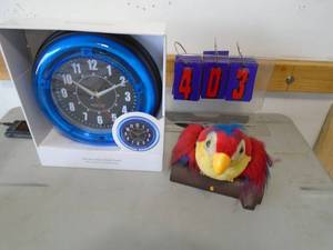 Talking parrot & led clock. As shown. CASH ON SITE ONLY. PICKUP IS MONDAY MAY 11TH FROM 11 AM TO 4 PM. REGARDLESS WHAT THE SCHEDULE STATES.