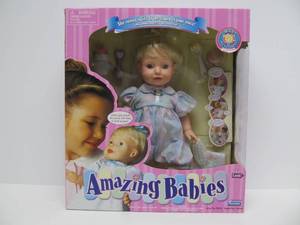 New in Box Amazing Babies Doll
