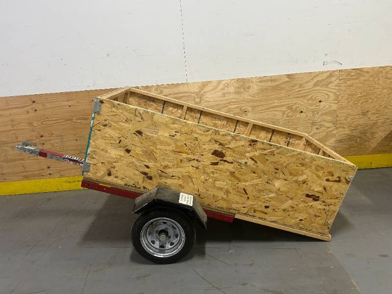 4 Foot Haul Master 1090 LB Capacity Utility Trailer with 12 Wheels and Custom Built Wooden Enclosure