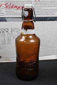 Assorted Amber Swing-Top Beer Bottles in Divided Cardboard Box