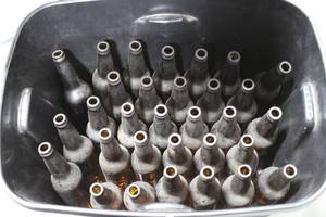 Assorted Empty Glass Beer Bottles in Tub - Homebrew Collectible