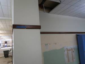 APPROX150 OF ANTIQUE TRIM BOARD IN HALLWAY.