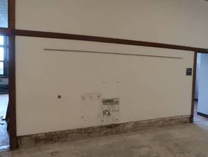 APPROX150 OF ANTIQUE TRIM BOARD IN HALLWAY. (START R 322