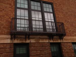 ANTIQUE WROUGHT IRON BALCONY