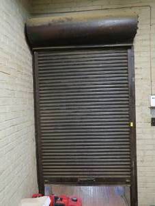 ANTIQUE ROLL DOWN FIRE DOOR