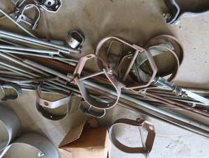 ASSORTMENT OF PIPE HANGERS  CLAMPS AND MORE