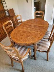 Beautiful Parquet Topped dining room Table with six chairs