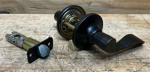 Defiant Simple Series Wave Aged Bronze Hall and Closet Door Lever EVLC2X703B