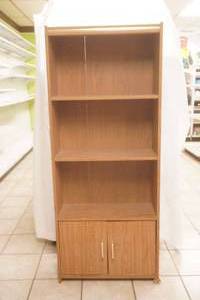 Pressed wood bookshelf with small cabinet. 24Wx9Dx59H