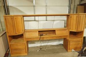 Solid Oak Lighted Headboard with Cabinets, and Mirrors. 111 wide by 5 tall by 17 deep. (opening in the middle is 69 wide)