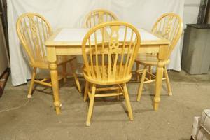 Light Oak Dining Set. Table is 36x45 with white tile inlay, flip-up leaf (15), and 4 chairs
