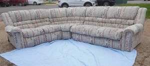 La-Z-Boy Sectional Recliner Couch. With 1 recliner, 1 drawer, 1 fold down table, and  Hide-a-bed.