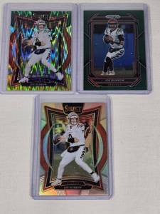 Lot of 3 Joe Burrow Football Cards Including Panini Select and Prizm Variants with Holo Effects.