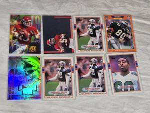 Lot of 8 Football Cards Featuring Michael Irvin, Joe Montana, and Cris Carter including Super Rookie and Then & Now Cards