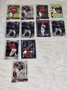 Lot of 11 Royce Lewis Rookie Cards including Bowman Chrome, Topps Heritage, and USA Stars & Stripes. Features various versions and special inserts.