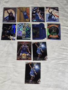 Lot of 11 Kevin Garnett Basketball Cards including Fleer Ultra, Prizm USA, and Optic Winner Stays Holo.