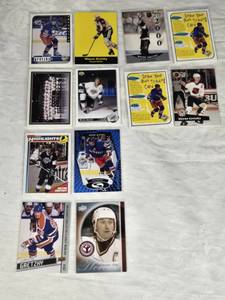 Lot of 12 Wayne Gretzky Hockey Cards featuring Upper Deck, Pro Set, and O-Pee-Chee with special features like The 2,000th Point and Frequent All-Star.