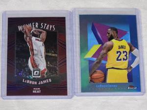Lot of 2 LeBron James Refractors including Panini Prizm and Topps Finest sets.