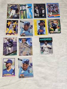 Lot of 13 Ken Griffey Jr. Baseball Cards featuring brands like Topps, Donruss, and Upper Deck, with special features including Star Power, Holo, and Season Highlights.