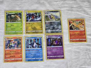 Lot of 7 Pokemon Holo Cards Featuring Moltres, Dusknoir, and Infernape