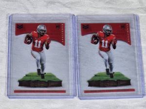 Lot of 2 Jaxon Smith-Njigba Rookie Football Cards from 2023 Panini Chronicles Magnitude Draft Picks - Ohio State Buckeyes.