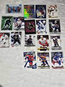 Lot of 17 Hockey Cards Featuring Wayne Gretzky, Leon Draisaitl, and Cale Makar. Includes Rookie Cards, Special Editions, and Upper Deck Variants.
