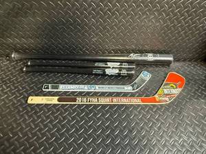 Minnesota Twins Ben Revere Bat and assorted mini Baseball Bats and Mini Hockey Sticks
