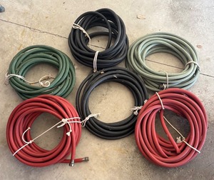 G - Six Solid Rubber Coiled Hoses