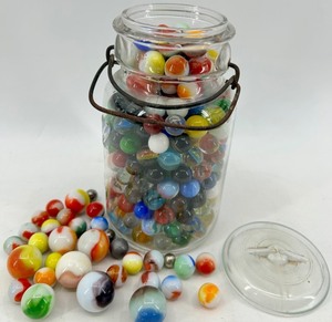 Glass Apothecary Jar Filled with Multicolor Swirl Marbles