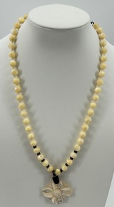 Bead Necklace with Carved Flower Pendant