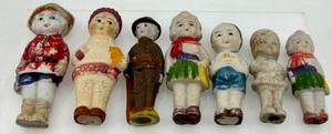Seven Vintage Made in Japan Ceramic Child Figurines in Hats