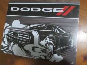 Dodge metal sign, measures 12 x 16...