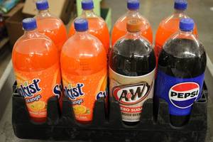 8-2 Liter Bottles of Soda Expired B...