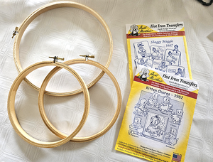 Embroidery Items  one hoop 8.5, two hoops 6.5 and two heat transfer�pattern packs.