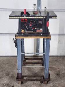 Craftsman Portable Table Saw Mounted on a Rolling Stand