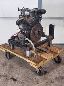 Small Ingersol Rand Diesel Engine on a Rolling Stand