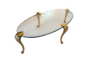 Oval Glass Coffee Table with Brass Leaf Motif Legs - 51 x 25 x 15 Inches