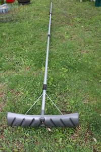 Snow Pusher With Telescoping Handle