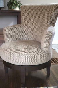 Beige Textured Upholstered Swivel Accent Chair
