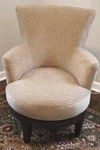 Beige Textured Upholstered Swivel Accent Chair