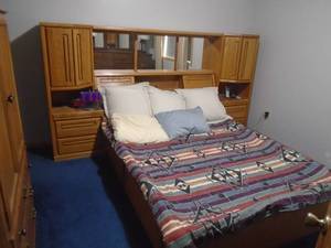 Complete bed & headboard. No mattress. May be queen size As shown. CASH ON SITE ONLY. PICKUP IS TUESDAY MAY 19TH FROM 11 AM TO 4 PM. REGARDLESS WHAT THE SCHEDULE STATES.