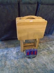 4 tv trays with stand. As shown. CASH ON SITE ONLY. PICKUP IS TUESDAY MAY 19TH FROM 11 AM TO 4 PM. REGARDLESS WHAT THE SCHEDULE STATES.