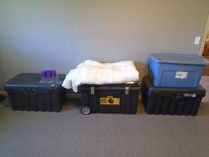 4 bins of misc clothes with bins. As shown. CASH ON SITE ONLY. PICKUP IS TUESDAY MAY 19TH FROM 11 AM TO 4 PM. REGARDLESS WHAT THE SCHEDULE STATES.