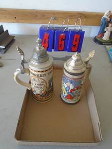 2 german steins. As shown. CASH ON SITE ONLY. PICKUP IS TUESDAY MAY 19TH FROM 11 AM TO 4 PM. REGARDLESS WHAT THE SCHEDULE STATES.