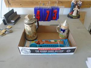 2 steins. As shown. With weiner dog hotdog slicer. As shown. CASH ON SITE ONLY. PICKUP IS TUESDAY MAY 19TH FROM 11 AM TO 4 PM. REGARDLESS WHAT THE SCHEDULE STATES.