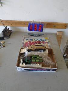 Diecast items with beer sign. As shown. CASH ON SITE ONLY. PICKUP IS TUESDAY MAY 19TH FROM 11 AM TO 4 PM. REGARDLESS WHAT THE SCHEDULE STATES.