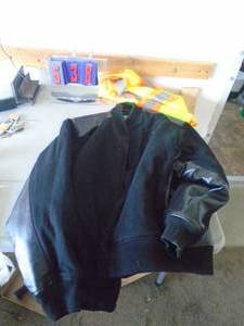 XXL leather & wool coat. As shown. Zipper may need help CASH ON SITE ONLY. PICKUP IS TUESDAY MAY 19TH FROM 11 AM TO 4 PM. REGARDLESS WHAT THE SCHEDULE STATES.