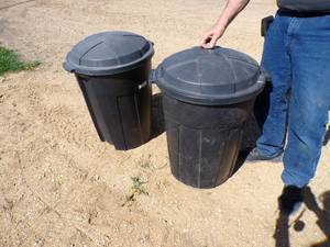 Two Rubbermaid Trash Can wLids