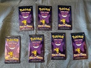 Lot of 7 sealed trick it trade pokemon packs